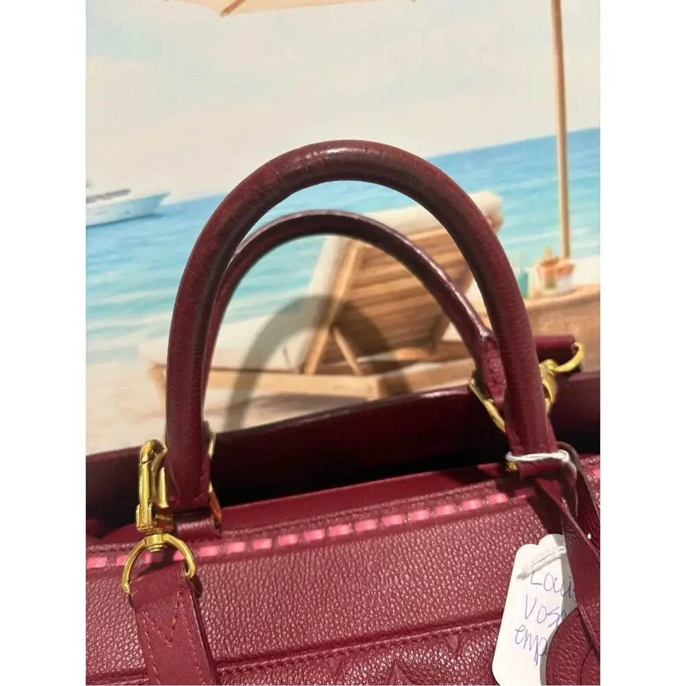 Authentic Louis Vuitton Monogram Empreinte Montaigne MM bag w/ Certificateate